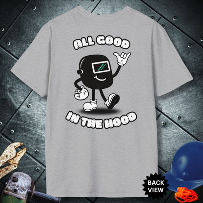 Grey t-shirt with a graphic design and text 'All Good in the Hood' on a metallic surface.